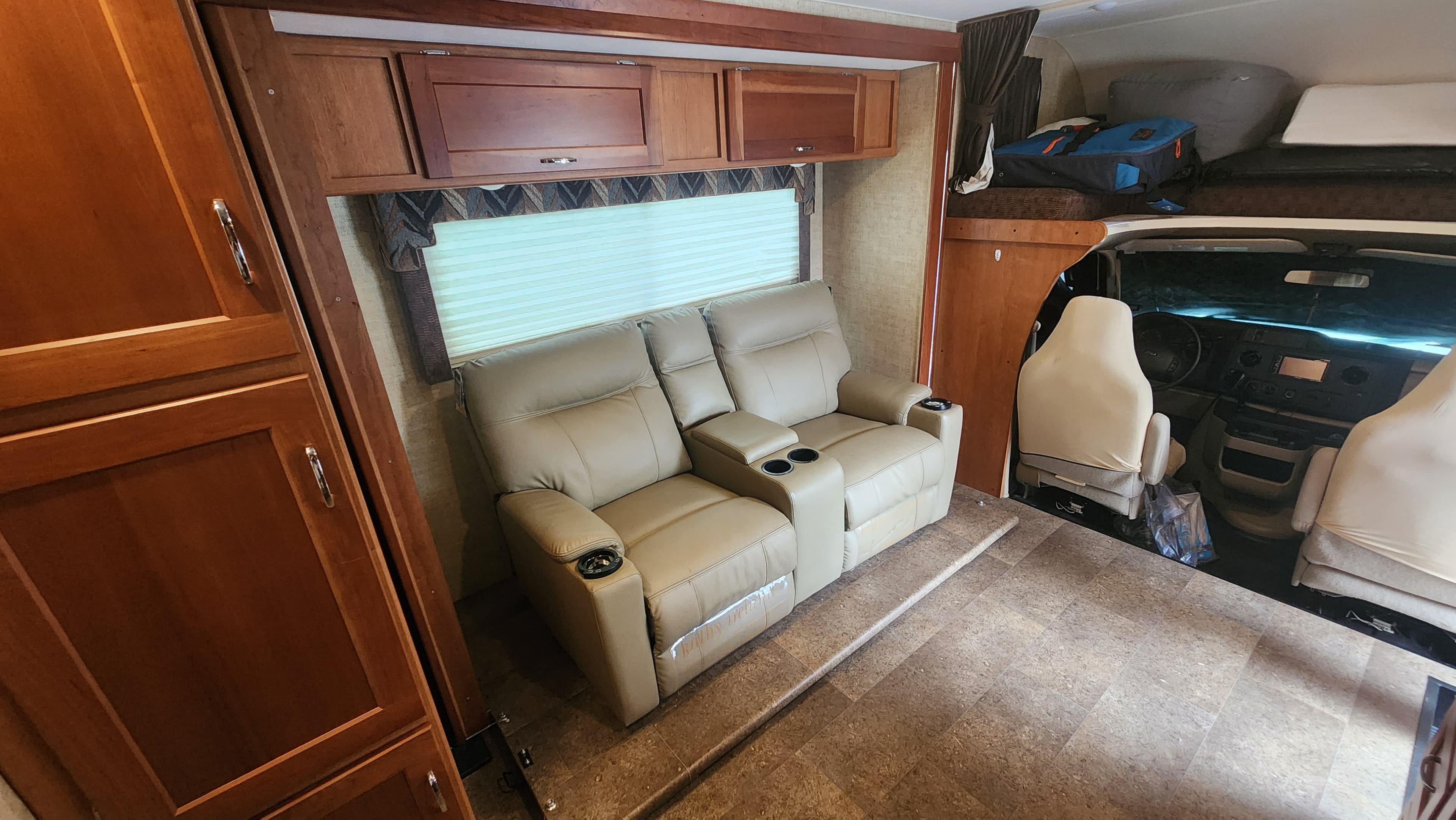RV motorcoach interior before custom dinette build — existing layout Montgomery County TX