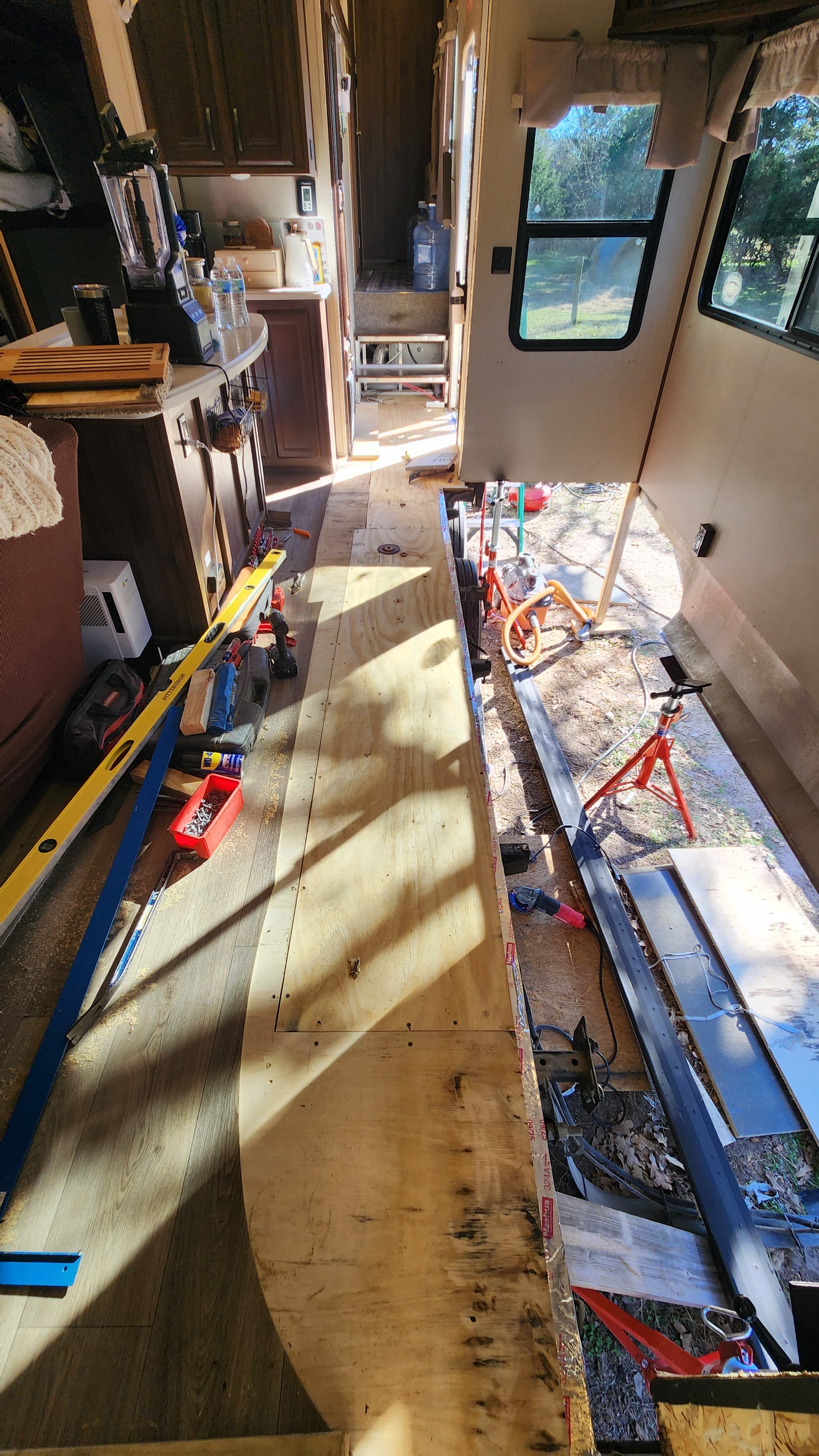 RV slide out floor replacement in progress — new subfloor installation Elite Reliability RV