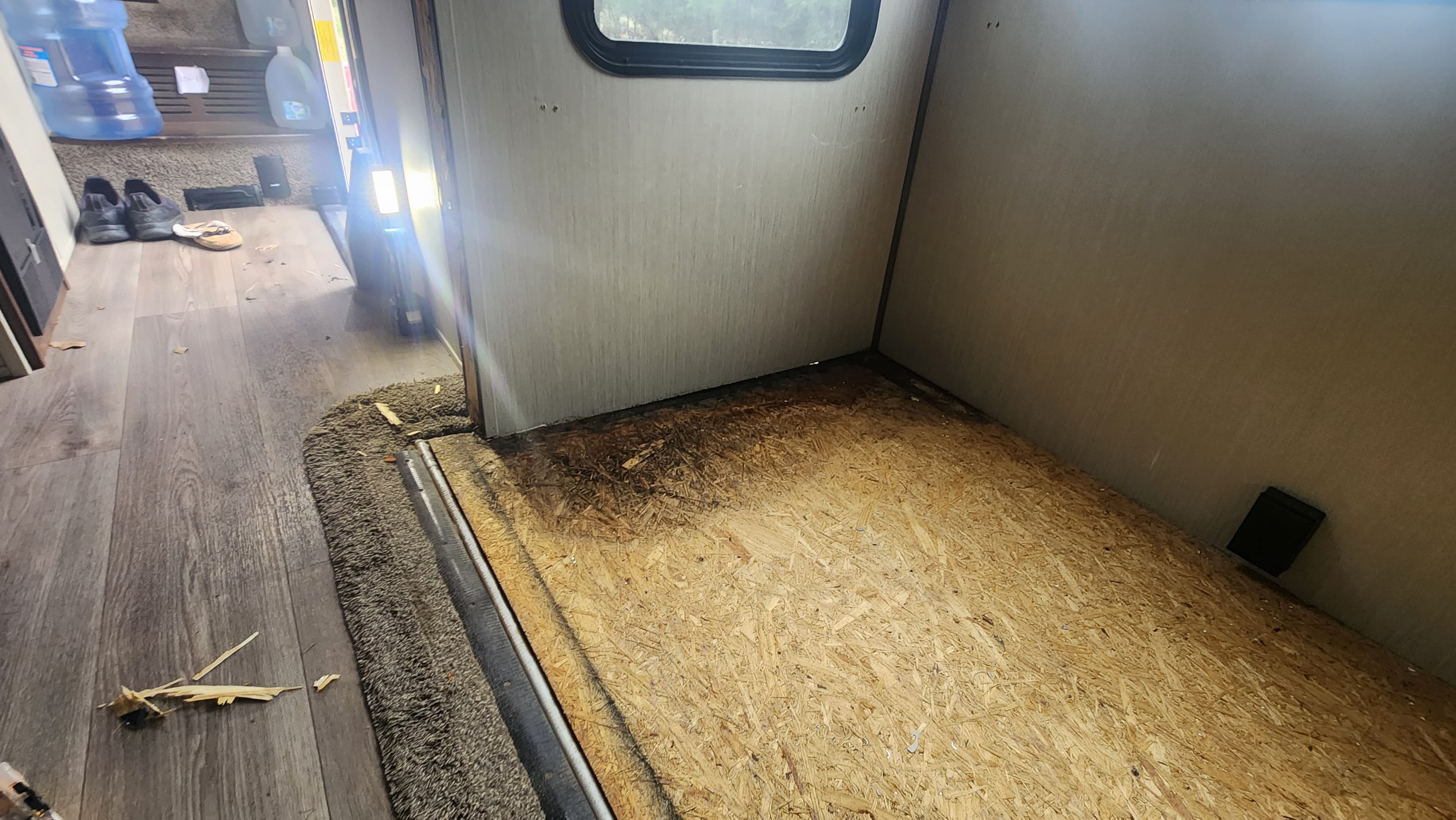 RV slide out subfloor deterioration detail — rot and damage from water intrusion
