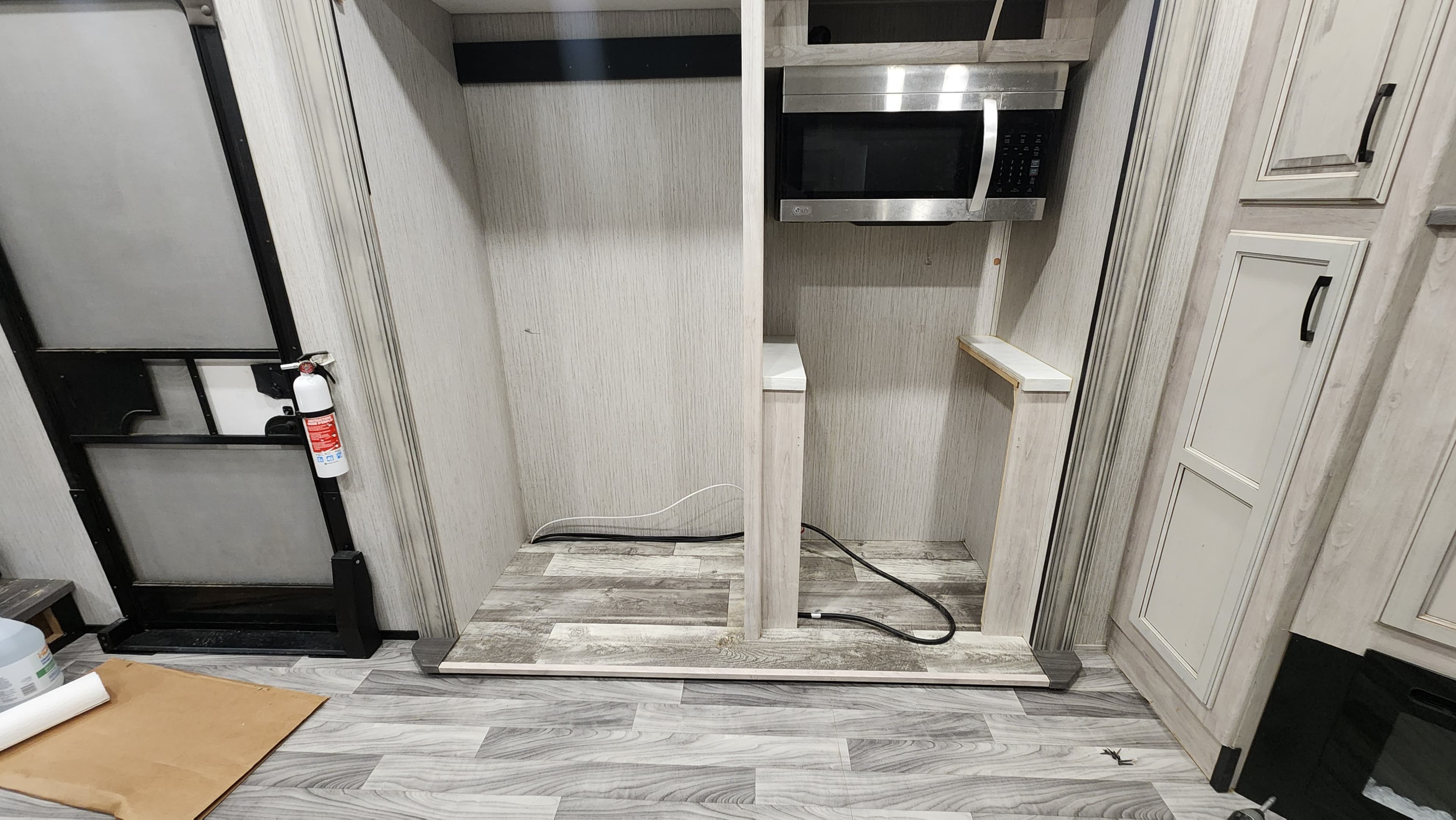 RV kitchen area mid-restoration — interior rebuild in progress Walker County TX